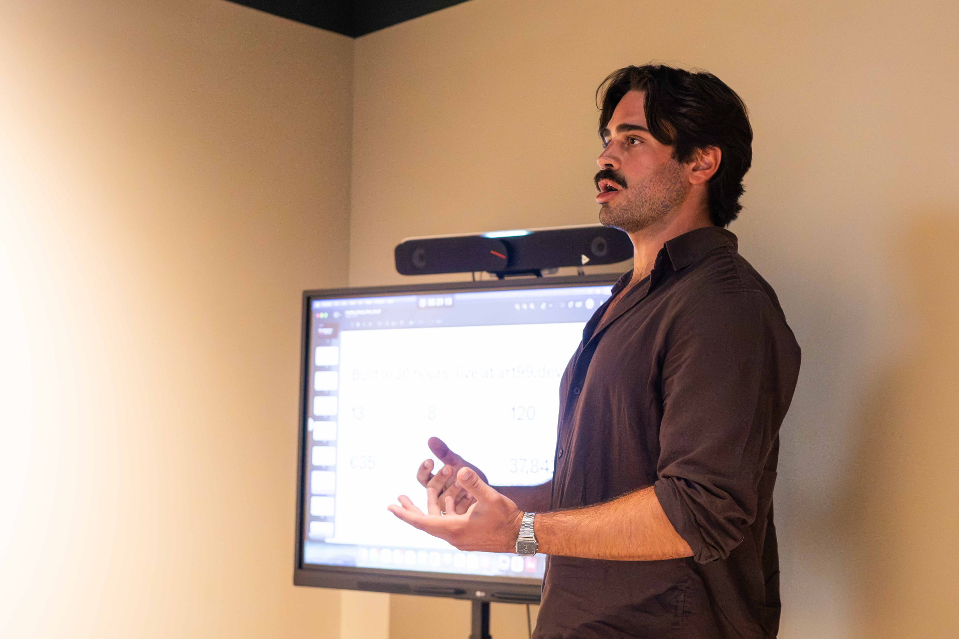 Participant presenting a legal-tech project during the LegalTech Hackathon at PaxRocket.