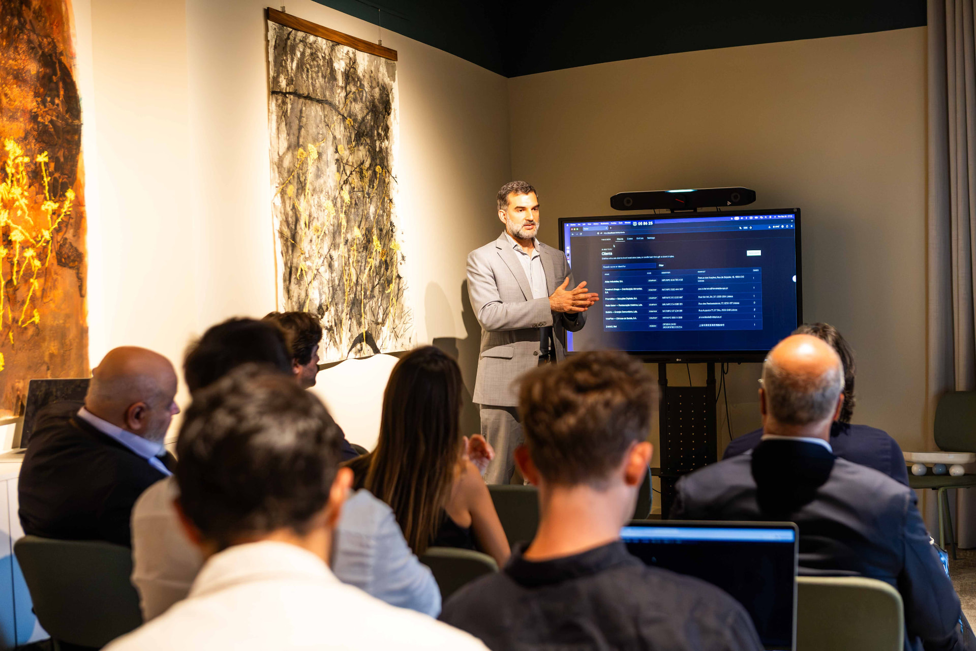 Presenter walking the audience through a prototype during the LegalTech Hackathon at PaxRocket.